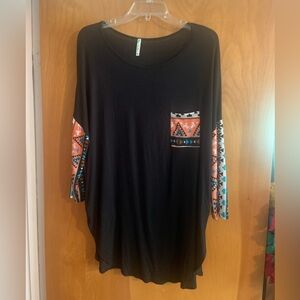 Pretty southwest top. Never worn.